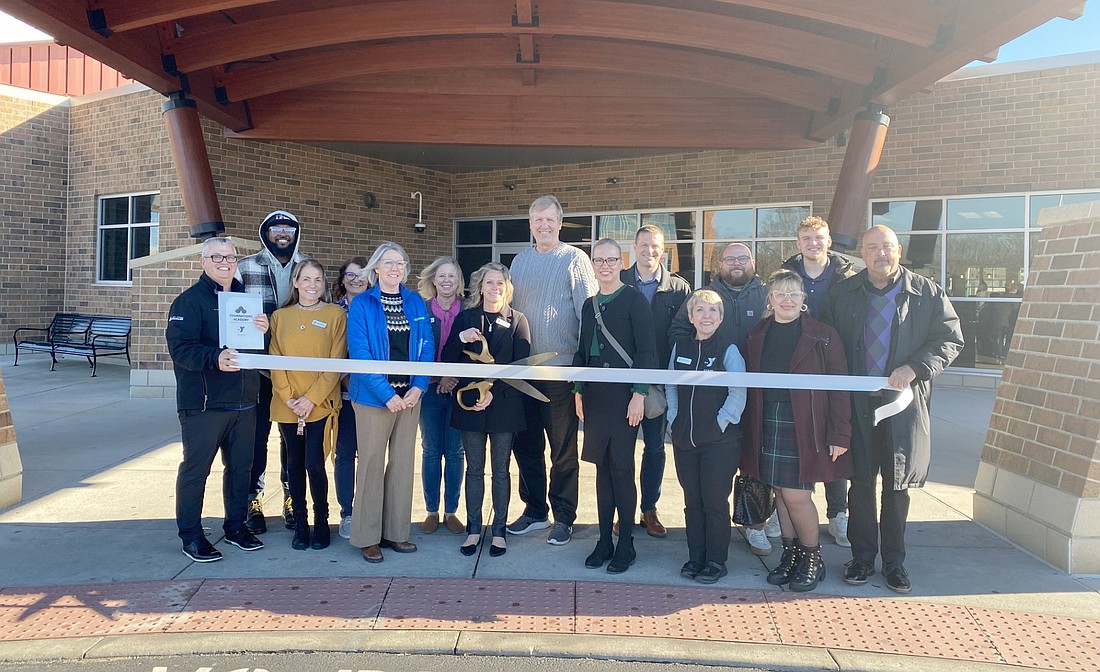 The Kosciusko Chamber of Commerce had a ribbon-cutting for Foundations Academy Training Center on Tuesday. It's located at Parkview Warsaw YMCA and will help train child care employees for necessary requirements. Pictured (L to R) are, front: Chamber President and CEO Rob Parker, Kosciusko Community YMCA Director of Finance Stacey Anderson, LaunchPad Director Sherry Searles, Kosciusko Community YMCA Director of Early Childhood Programming Ashlee Parker, Kosciusko County Community Foundation CEO Stephanie Overbey, Kosciusko Community YMCA Director of Healthy Living Tracy Frick, Chamber Events Coordinator Nora Christiansen and Chamber Member Relations Manager Scott Wiley; back: Chamber ambassador Shawn Brown, Kosciusko Community YMCA Membership Director Lori Haywood, Kosciusko Community YMCA Director of Human Resources Heidi Moseley, Kosciusko Community YMCA CEO Dr. Jim Swanson, Kosciusko Community YMCA Board Member Chris Nycz, Kosciusko Community YMCA Director of Marketing and Fund Development Ben Keffer and Chamber intern Micah Martin. Photo by Leah Sander, InkFreeNews