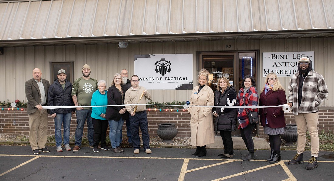 The Kosciusko Chamber of Commerce had a ribbon-cutting for Westside Tactical on Thursday. It's owned by Curtis Stavedahl and located at 1621 W. Lake St., Warsaw. Shown (L to R) are Chamber Member Relations Manager Scott Wiley, Chamber ambassadors Josh Coleman and Shawn Bianchini, Stavedahl's mother Becky Stavedahl, Stavedahl's wife Andrea Stavedahl, Stavedahl's friend Brent Dyer, Stavedahl, Chamber ambassadors Stacey Leek, Dawn Jaggers and Kristi Jackson Hull; Chamber Events Coordinator Nora Christiansen, Chamber ambassador Shawn Brown. Photo by Lauren Klusman, Kosciusko Chamber of Commerce