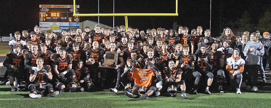 The Warsaw football team poses for a team photo after winning the first Semi-State title in school history last week.