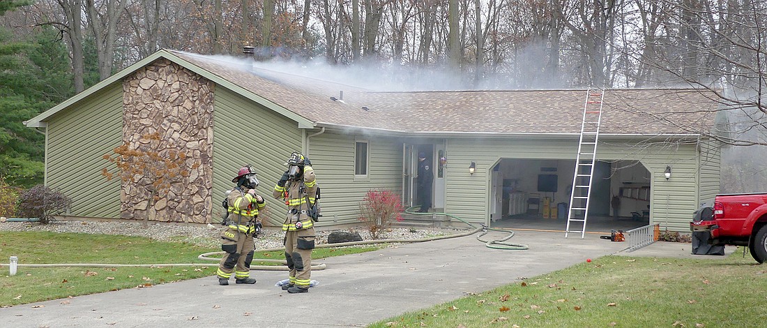 Firefighters were able to quickly knock down Thursday's attic fire on Antler Drive. by Gary Nieter, Times-Union