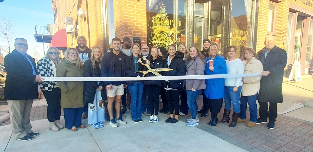 Kosciusko Chamber of Commerce held a ribbon-cutting for The River Coffeehouse’s new location downtown Warsaw Tuesday. Photo by Jackie Gorski, Times-Union