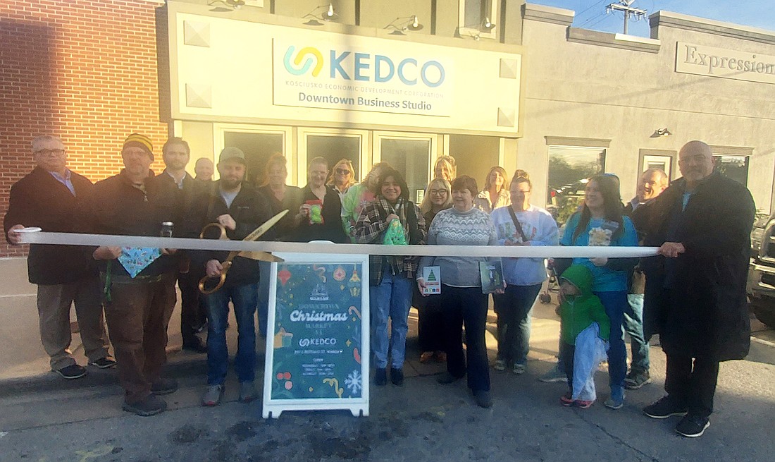 Kosciusko Chamber of Commerce held a ribbon-cutting for the Downtown Christmas Market Tuesday. Photo by Jackie Gorski, Times-Union