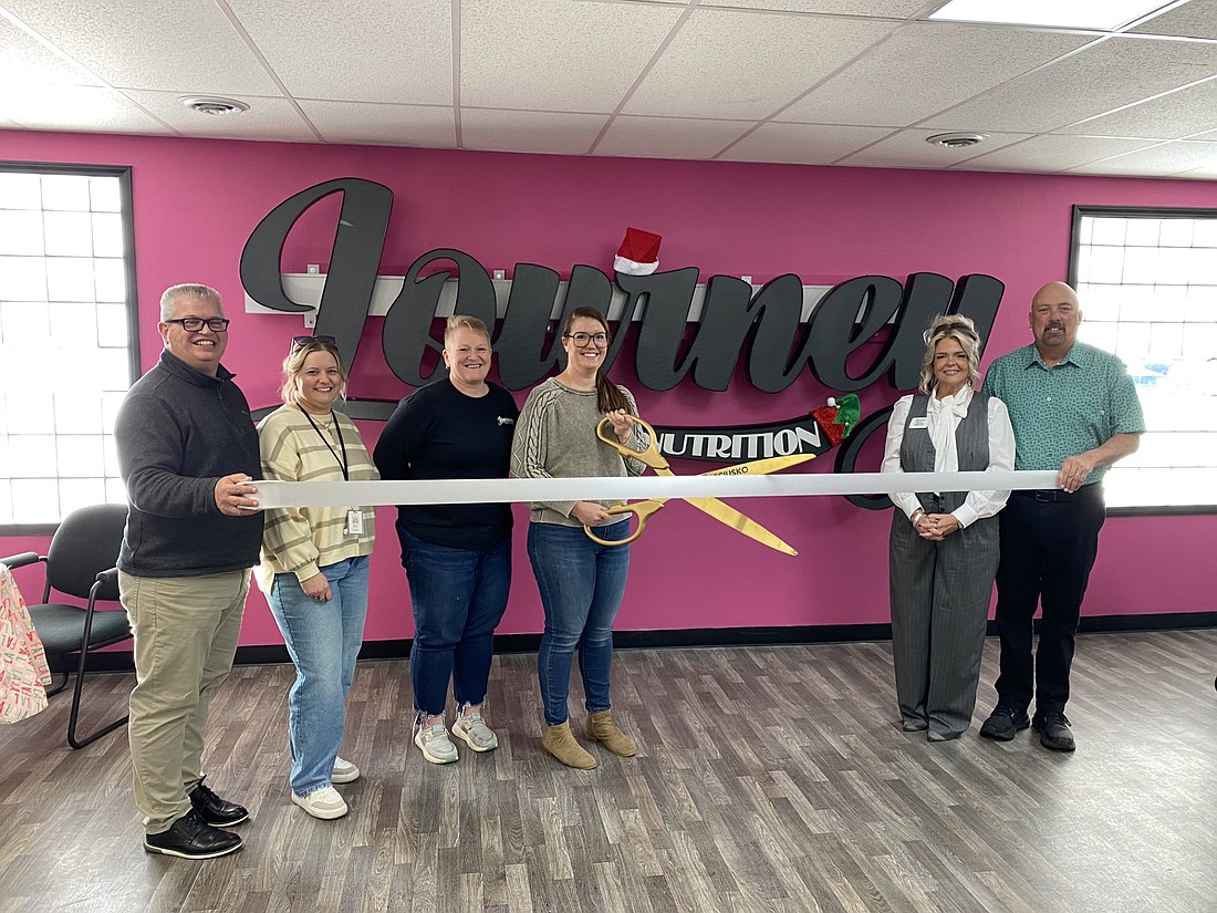 The Kosciusko Chamber of Commerce had a ribbon-cutting Friday for Journey Nutrition to mark the smoothie and juice bar's move to 129 N. Roosevelt St., Warsaw. Pictured (L to R) are Chamber President and CEO Rob Parker, Chamber Ambassador Kyrie Maierle, Journey Nutrition employee Angie Ricket, Journey Nutrition Owner Sarah Moore, Chamber Ambassador Stacey Leek and Chamber Member Relations Manager Scott Wiley. Photo by Leah Sander, InkFreeNews