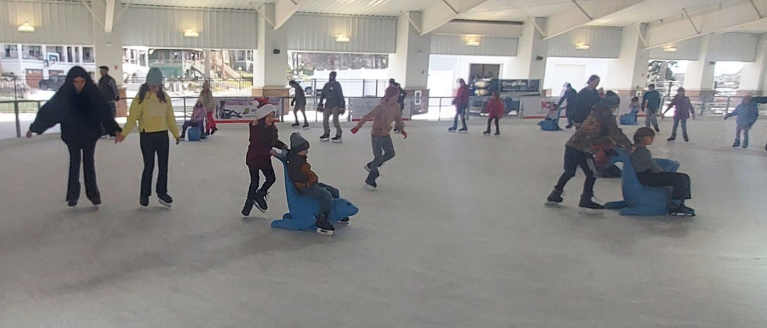 People take advantage of the free skate day sponsored by the K21 Health Foundation at the Miller Sunset Pavilion Saturday. Photo by Jackie Gorski, Times-Union.