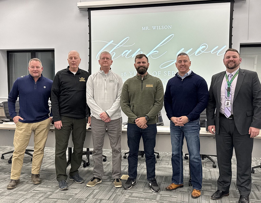 Mike Wilson was honored during the regular December Wawasee School Board meeting Tuesday. Wilson has been a pillar on the board for 18 years. Board members pictured (L to R) are Andy Cripe, Don Bokhart, Wilson, Neil Likens, Steve Baut and Superintendent Dr. Steve Troyer. Photo by Marissa Sweatland, InkFreeNews.