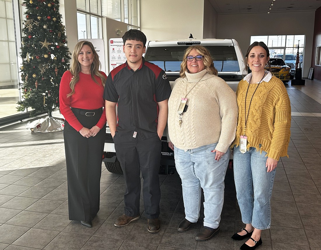 Oscar Salas, a Warsaw Area Career Center student, is nominated for an Impact Award in the category of Work-Based Learner of the Year through the Institute for Workforce Excellence for his contribution to Toyota of Warsaw. Pictured (L to R) are Emily Illingworth Kosnik, general manager and owner of Toyota of Warsaw; Salas; Angie Heinsman, Work-Based Learning coordinator at Warsaw Area Career Center; and Emily Campbell, WACC assistant director. Photo by David Slone, Times-Union