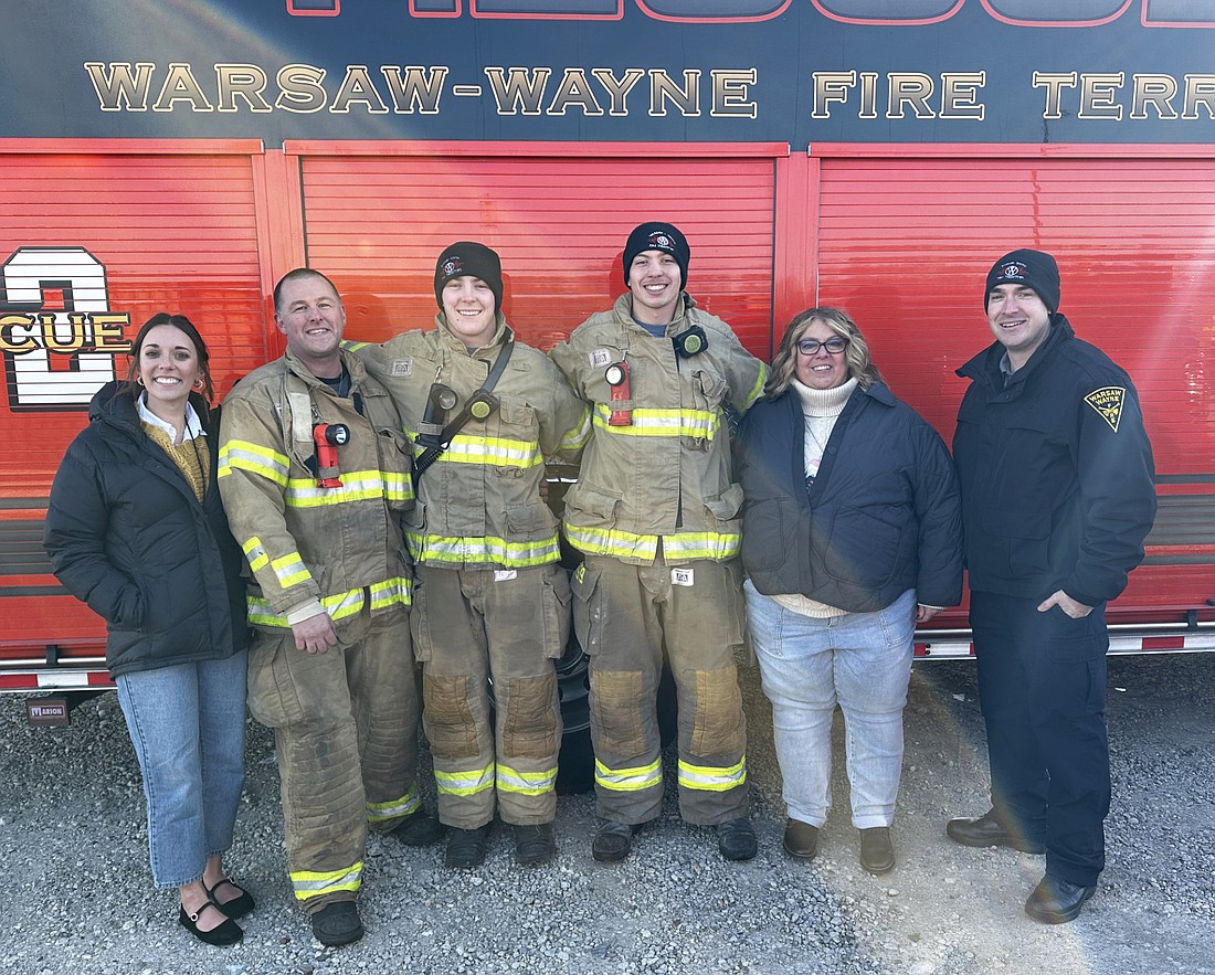 Pictured (L to R) at the Warsaw-Wayne Fire Territory training site Friday are Emily Campbell, Warsaw Area Career Center assistant director; WWFT Lt. Max Kinsey; WACC Work-Based Learning interns Cohen Heady and Reed Nelson; Angie Heinsman, WBL coordinator; and WWFT Chief Joel Shilling. Photo by David Slone, Times-Union