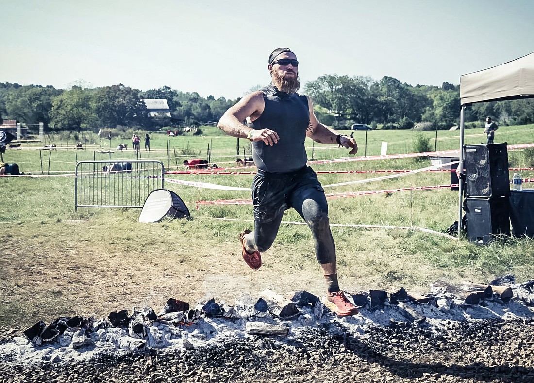 Alex Jackson crosses the finish line at the Nashville Spartan Sprint. Photo Provided