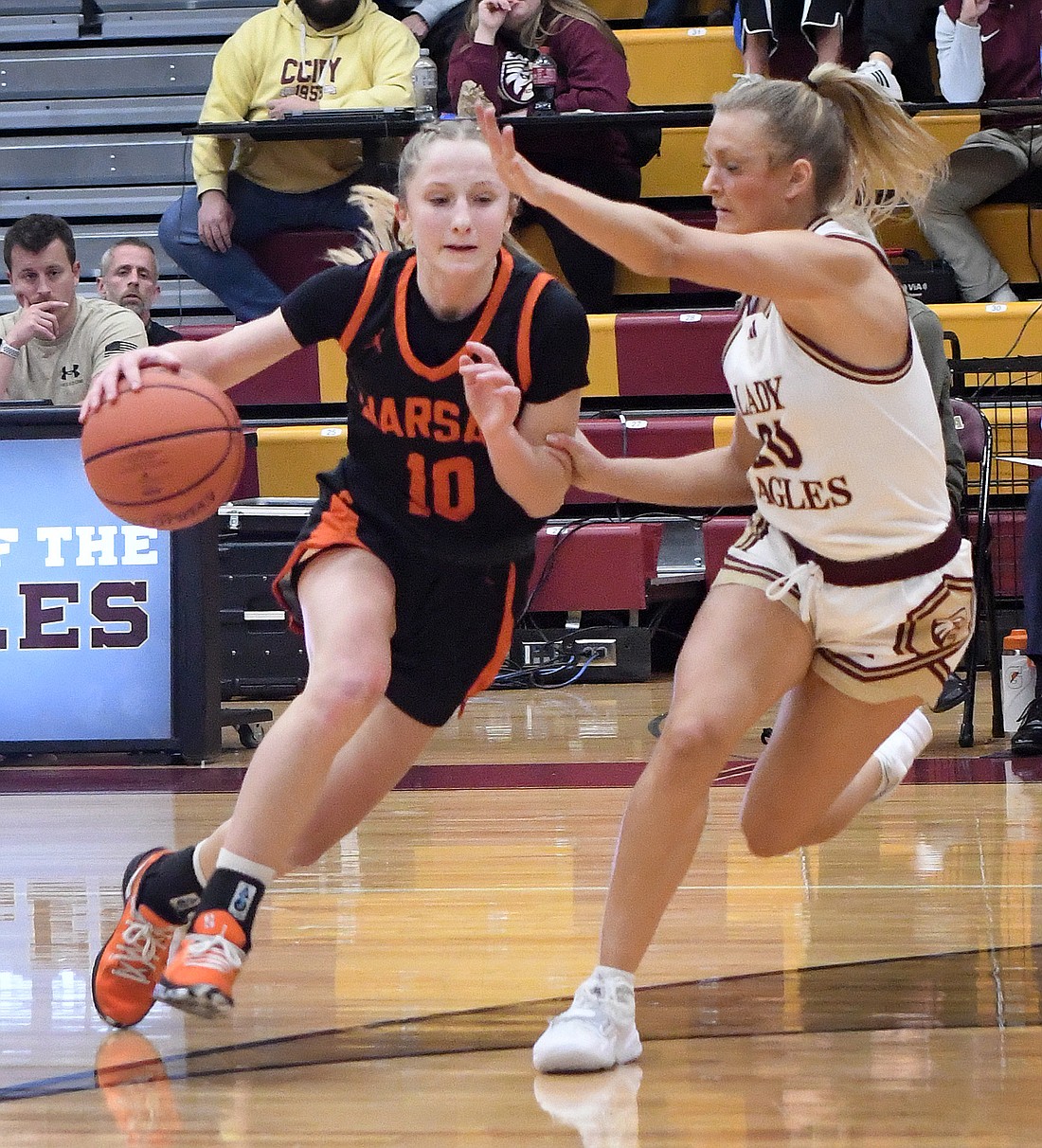 Warsaw junior Joslyn Bricker drives to the basket during the second quarter as Leah Hertel of Columbia City defends....Nieter