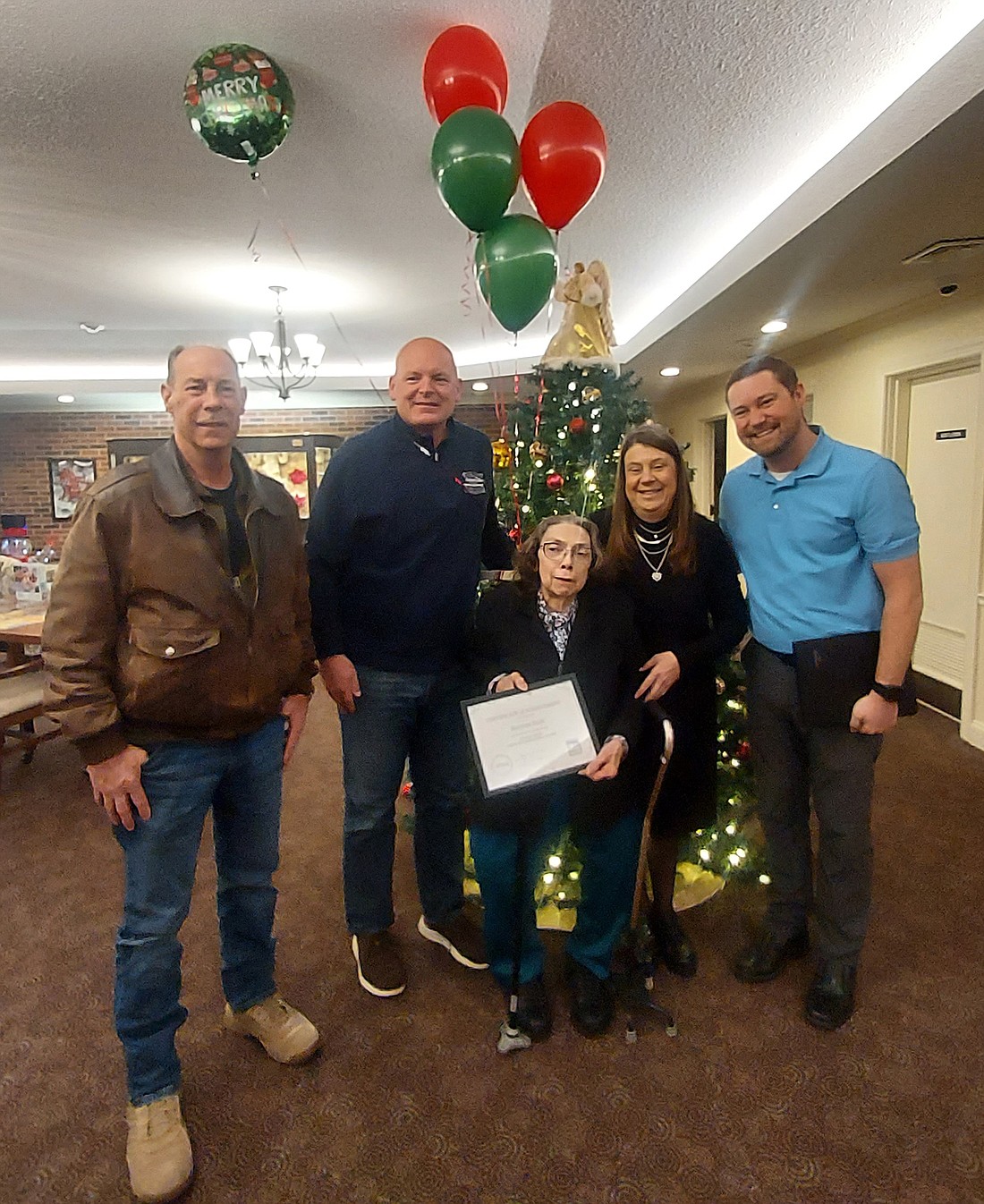 Pictured (L to R) are inspector Tom Bulger, Warsaw Mayor Jeff Grose, Grace Village resident Marvene Scott, North Central Indiana Housing Program Manager Vicki Haines and Grace Village CEO Justin Kimbrell. Photo by Jackie Gorski, Times-Union