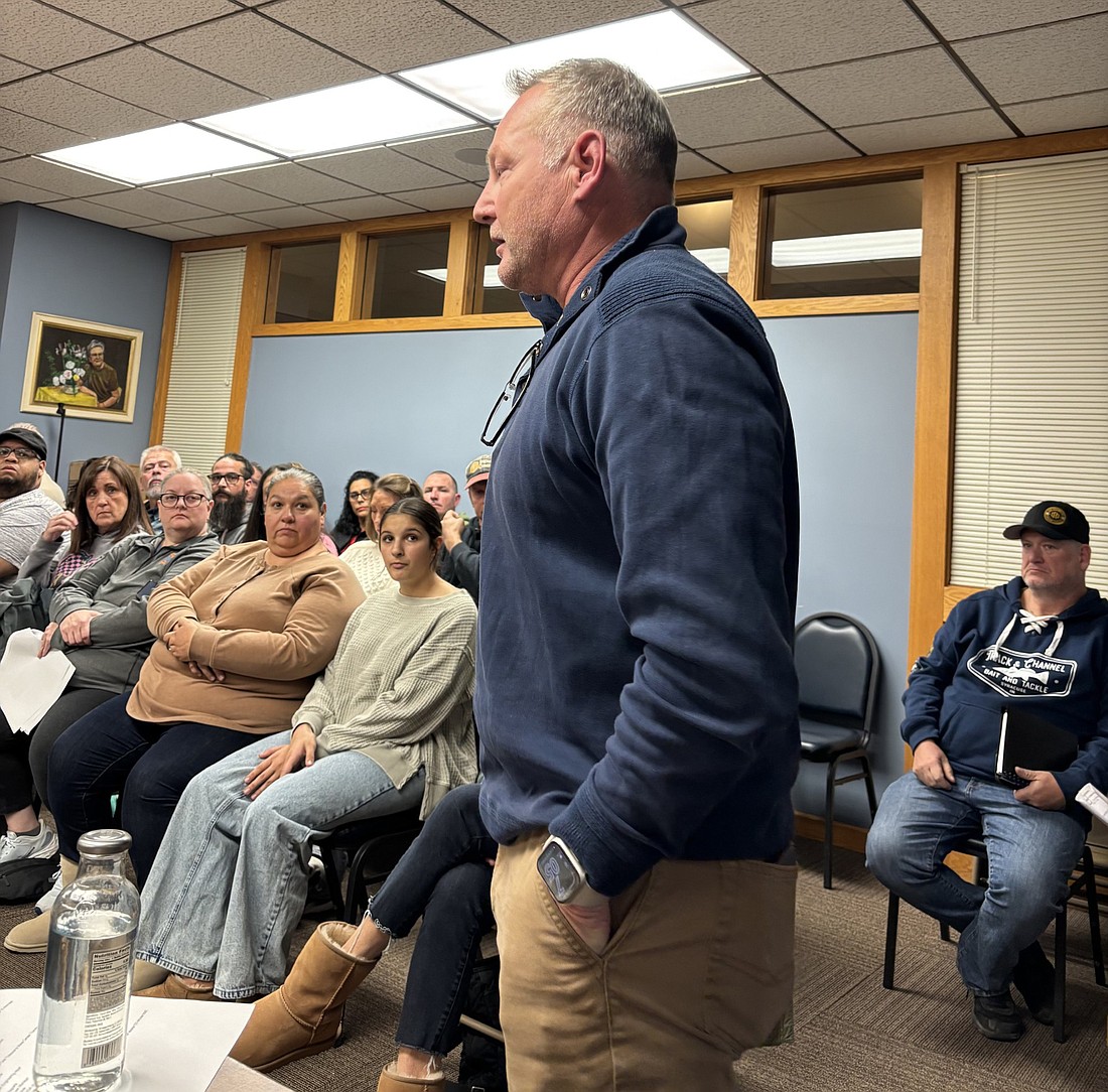 Andy Cripe, of Main Channel Marina, addressed the Syracuse Town Council and a packed council chambers Tuesday evening. Cripe wanted to update the public about his renovation plans after the fire his business sustained. Photo by Denise Fedorow