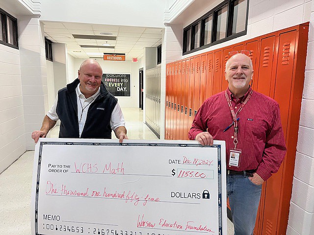 Daniel Ayers and George Straits received a Red Apple grant for Math XL software for high school math classes at Warsaw Community High School. Photo Provided