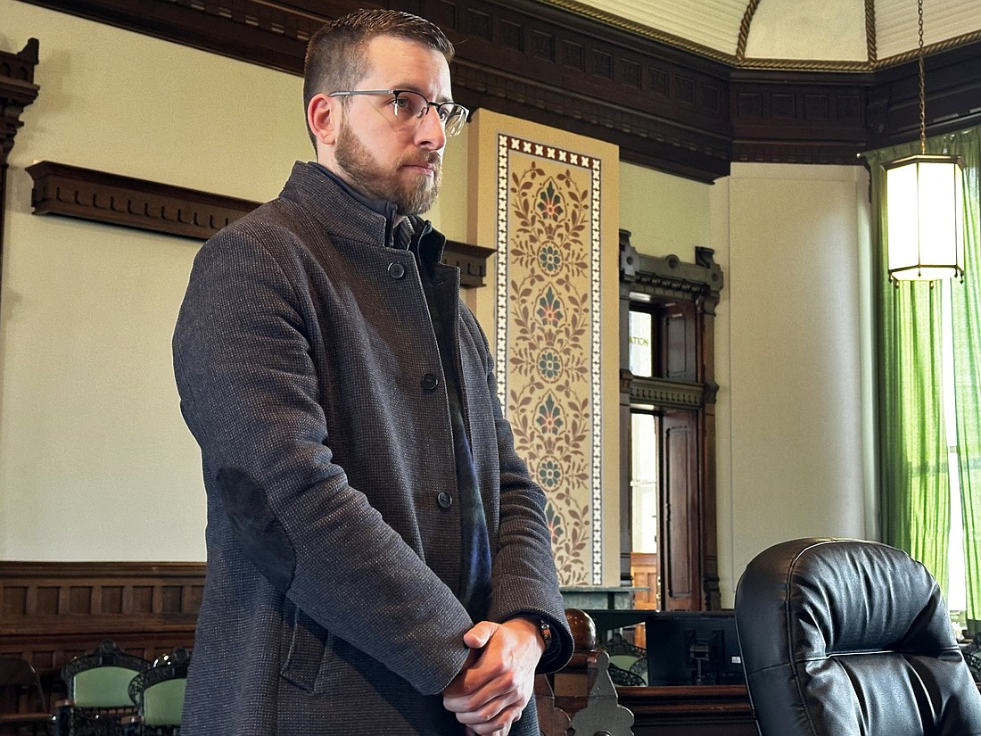 Thaddeus Wallin, owner of The Golf Club of Warsaw, 318 Enterprise Drive, Warsaw, explains to the Kosciusko Alcohol Tobacco Commission Thursday about why he was seeking a beer and wine retailer permit for his business. Photo by David Slone, Times-Union