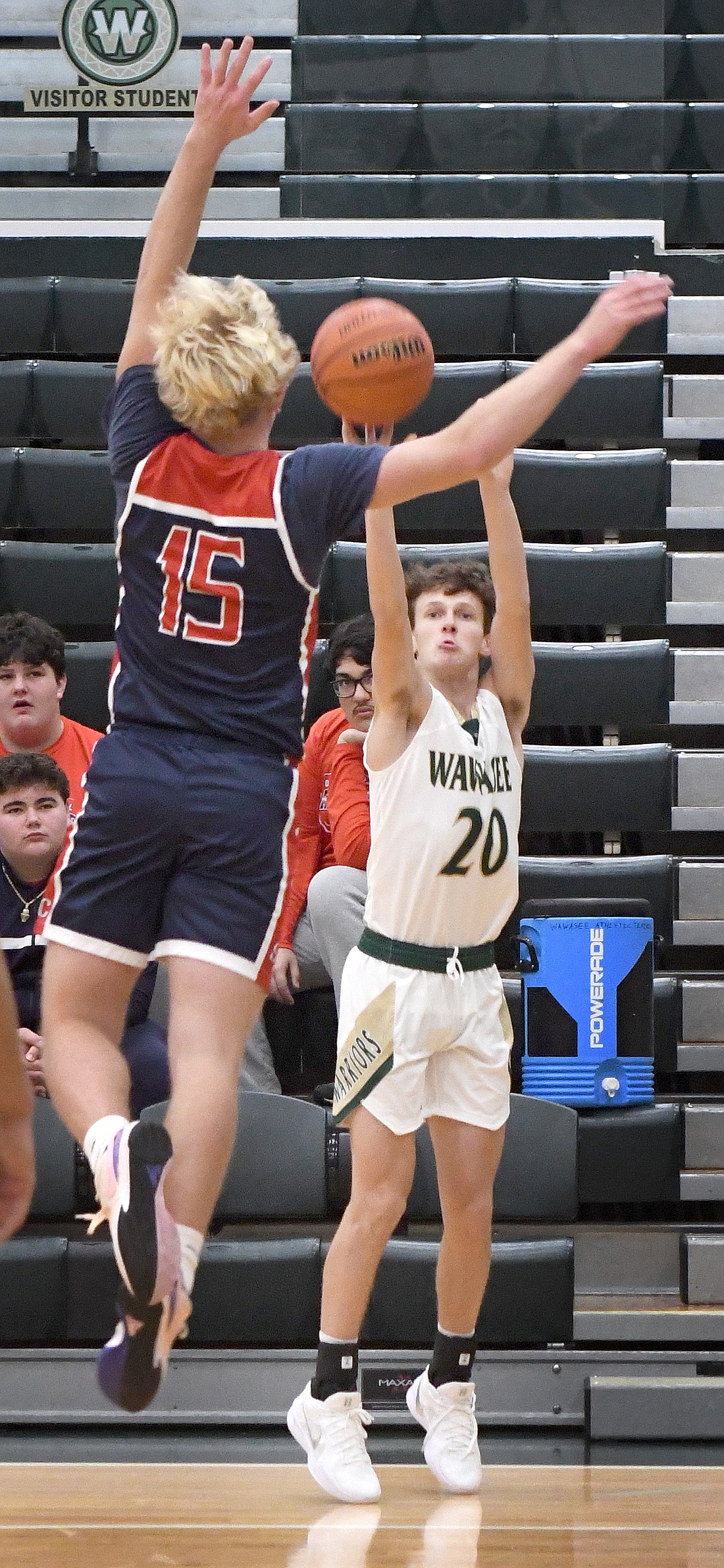 Wawasee senior Weston Hoffert shoots a three-pointer during the first quarter of Friday morning's game against South Central...Nietet