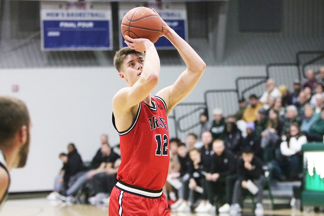 Pictured is Ian Raasch (game-high 20 points) at the free throw line during Grace's win at Huntington on Wednesday