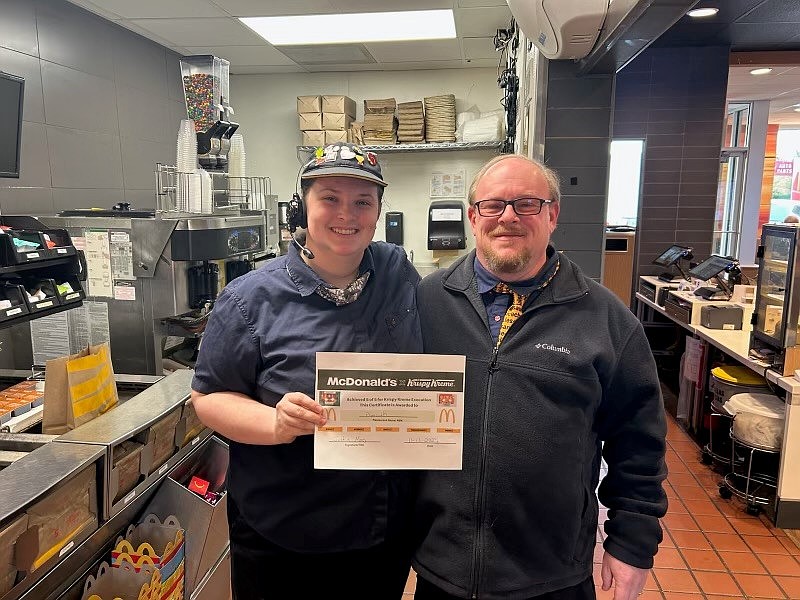 Billy Boldt Jr. (R) stands with his daughter, Lilly, manager at the McDonald’s in Knox.    Photo Provided