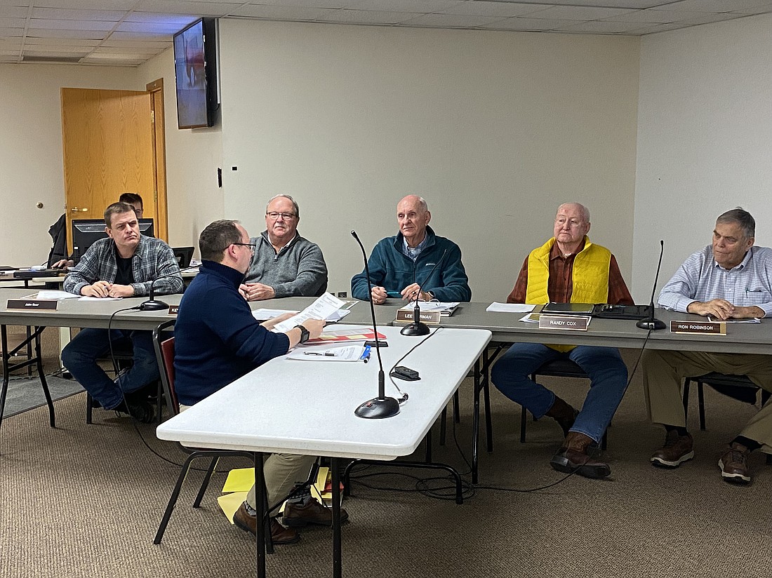 Pictured (L to R) toward the end of the Kosciusko County Board of Zoning Appeals meeting on Tuesday are, back row: board members John Beer, Kevin McSherry, Chairman Dr. Lee Harman, hearing officer Randy Cox and Board Vice Chairman Ron Robinson; front: Kosciusko County Area Plan Commission Director Matt Sandy. Photo by Leah Sander, InkFreeNews