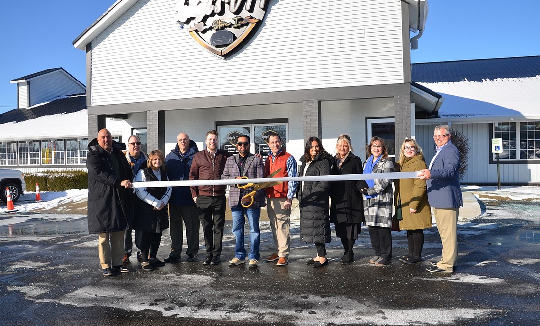 Luigi’s VIP Car Store in Warsaw celebrated its opening, which was in December, with a ribbon-cutting Wednesday, hosted by the Kosciusko Chamber of Commerce. Pictured (L to R) are Scott Wiley, Kosciusko Chamber of Commerce; James Kofalt, vice president of Transformative Carpet Cleaning; Dawn Jaggers, Beth Harris State Farm, chamber ambassador; Anthony Booker, Ivy Tech Community College, chamber ambassador; Dominic Kurosky, Luigi’s VIP Car Store; Luis Hernandez, owner, Luigi’s VIP Car Store; Bernie Martinez, Luigi’s VIP Car Store; Raquel Kline, Paddock Springs, chamber ambassador; Stacey Leek, Stillwater Hospice, chamber ambassador; Tracy Speigle, Via Credit Union, chamber ambassador; Nora Christiansen, the chamber’s event coordinator; and Rob Parker, CEO and president of the chamber. Photo by Phoebe Muthart, InkFreeNews