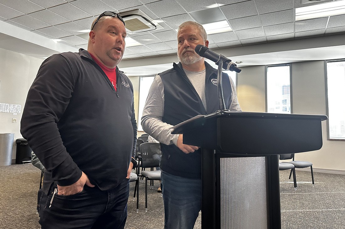 Mike Cusick (R), KCV Cycling president, and Nick Hauck, KCV Cycling treasurer, request road closures for Fat + Skinny Fire Festival events May 16 at Friday’s Warsaw Board of Public Works and Safety meeting. Photo by David Slone, Times-Union