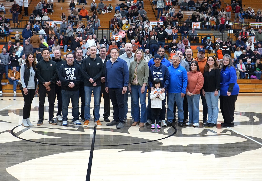 Warsaw Community Schools administrators Dr. David Hoffert, Krista Polston, Kyle Carter, Steven Boyer and Tracy Horrell, along with WCS board members Matt Deuel, Tom Westerhof and Randy Polston, gathered with Chad Towner, Dr. Patrick Ilada, Dr. Alex Tanase, Dr. Nick Finley and other members of the Lutheran Kosciusko Hospital leadership team to celebrate LKH's ongoing partnership. Photo Provided.