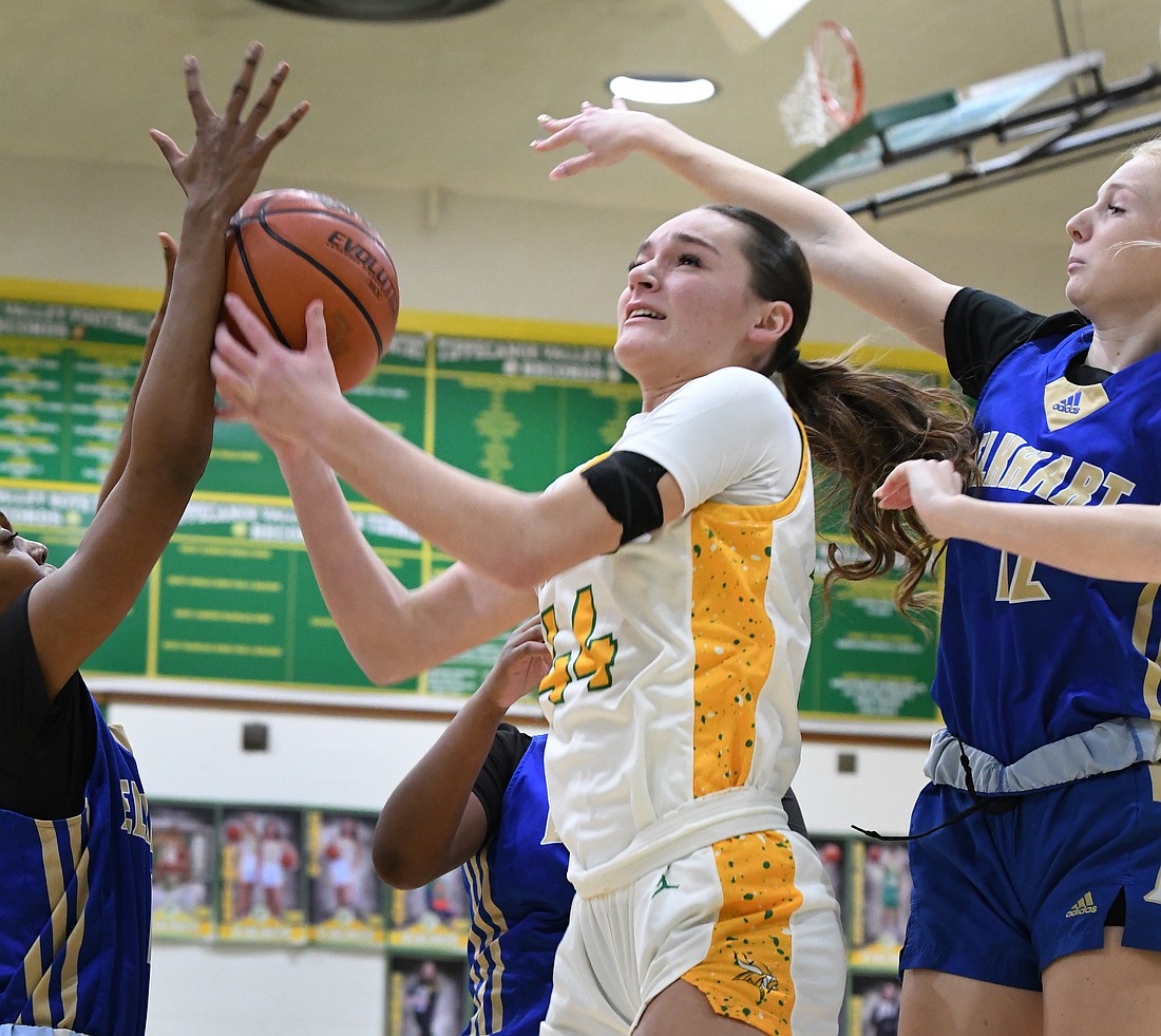 Tippecanoe Valley senior Carlee Snyder battles under the basket during Wednesday night's home game against Elkhart...Nieter