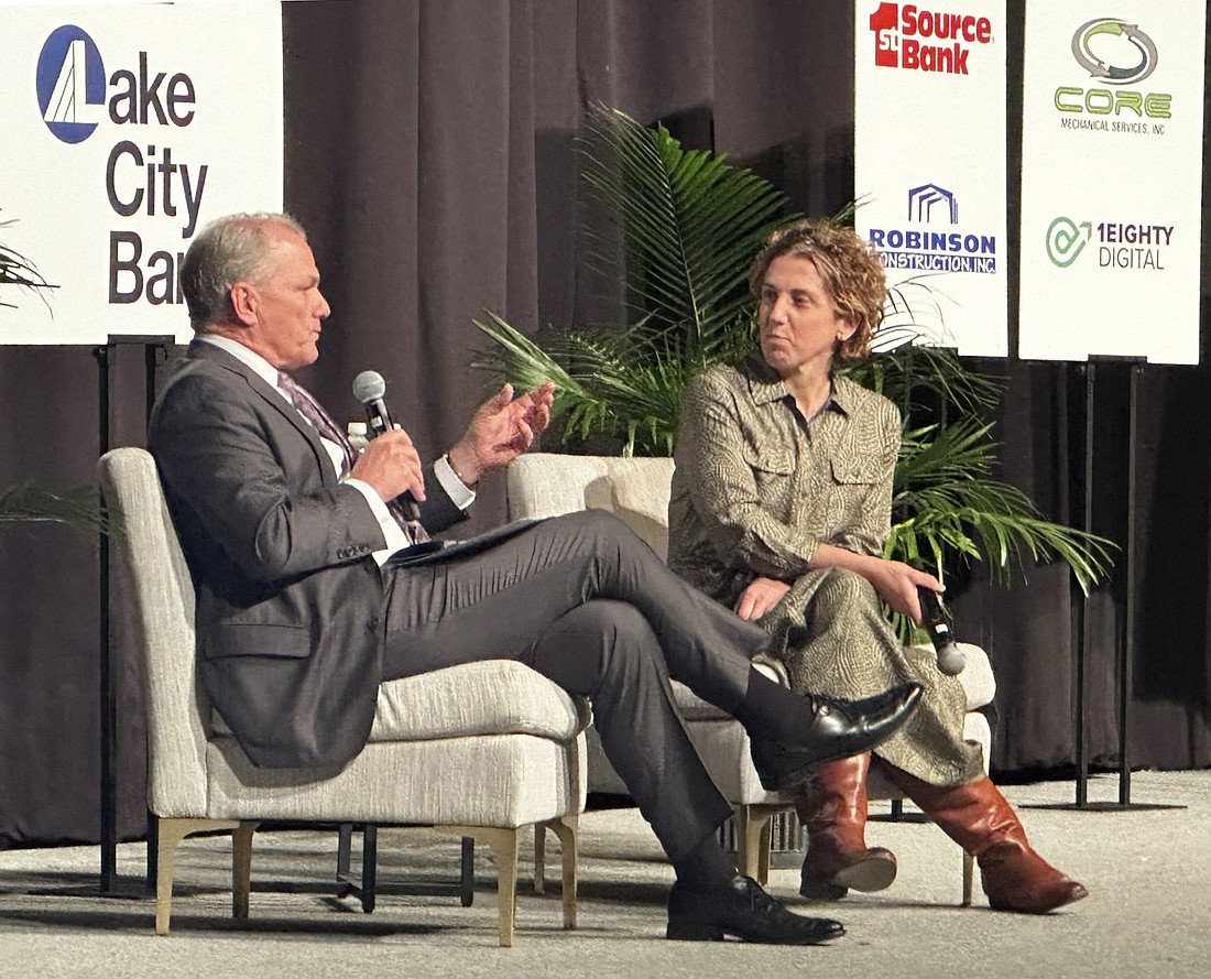 Vanessa Green Sinders (R) listens as Lake City Bank Chairman and CEO David Findlay (L) poses a question to her during their “fireside chat” at the Kosciusko Chamber of Commerce’s 113th Annual Awards Dinner Thursday night at the Manahan Orthopaedic Capital Center. Photo by David Slone, Times-Union