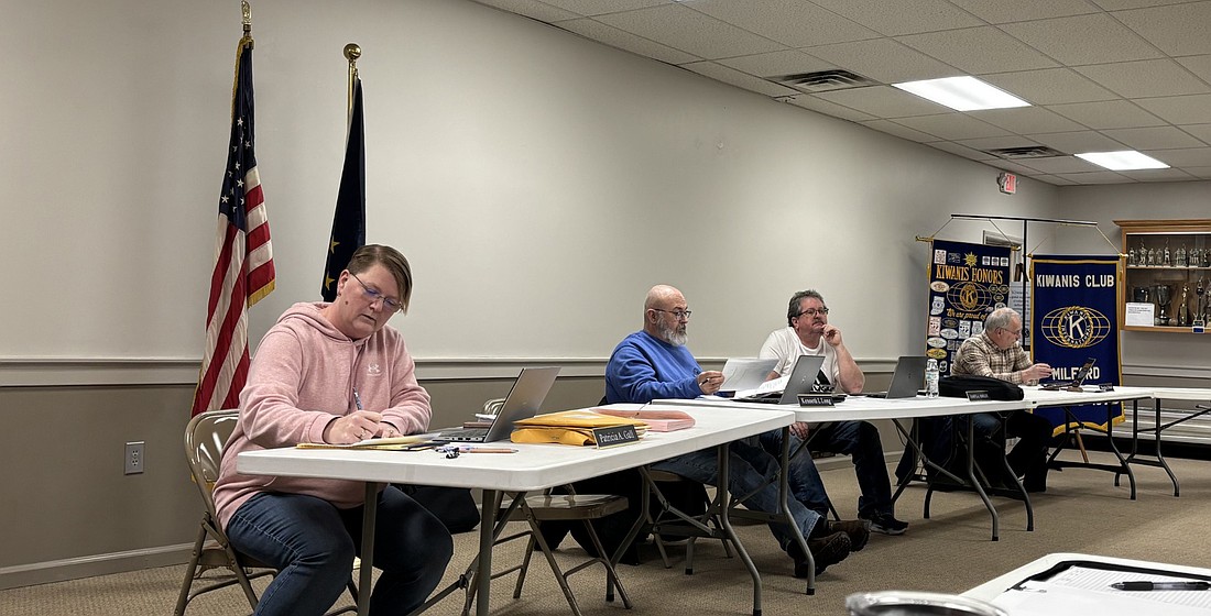 Milford Town officials prepare to start the regular council meeting Monday evening. Pictured (L to R) are Clerk-Treasurer Tricia Gall, Councilmen Ken Long and Jim Smiley and Council President Doug Ruch. Photo by Denise Fedorow.