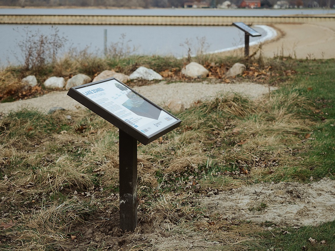 Educational signage is installed along the shores of Center and Pike lakes. Photo Provided.