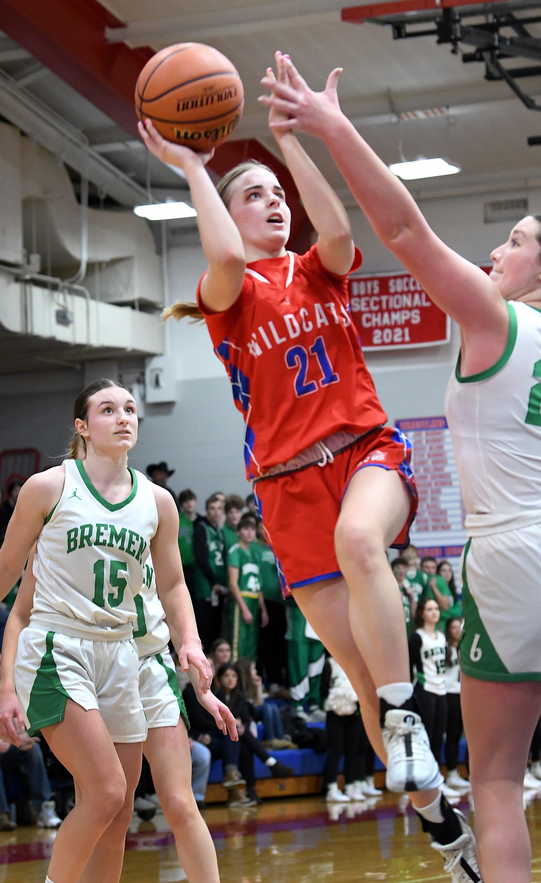 Whitko sophomore Jayma Stonebraker focues on the basket while gliding past a Bremen defender during the fourth quarter...Nieter