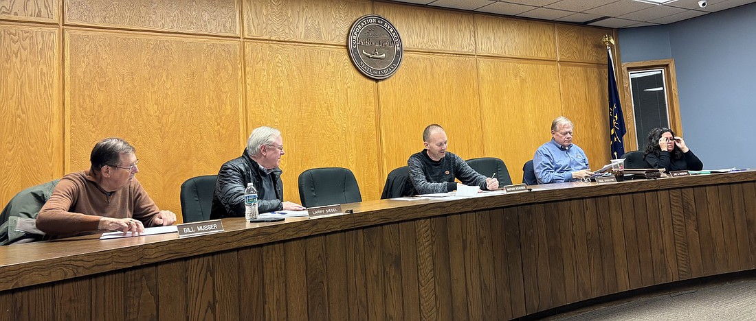 Syracuse Council members made quick work of Tuesday’s agenda. Pictured (L to R) are Councilmen Bill Musser, Larry Siegel and Nathan Scherer, town attorney Jay Rigdon and Clerk-Treasurer Virginia Cazier. Photo by Denise Fedorow