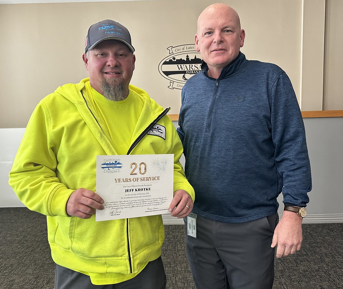 The service anniversaries of three city employees were recognized Friday at the Warsaw Board of Public Works and Safety meeting. Warsaw Police Department Sgt. Jaime de la Fuente was recognized for 15 years; Aaron Bolinger, Warsaw-Wayne Fire Territory, 25 years; and Jeff Krotke, Wastewater treatment utility, was recognized for 20 years of service to the city. Pictured (L to R) are Krotke and Warsaw Mayor Jeff Grose. Bolinger and de la Fuente were unable to attend. Photo by David Slone, Times-Union