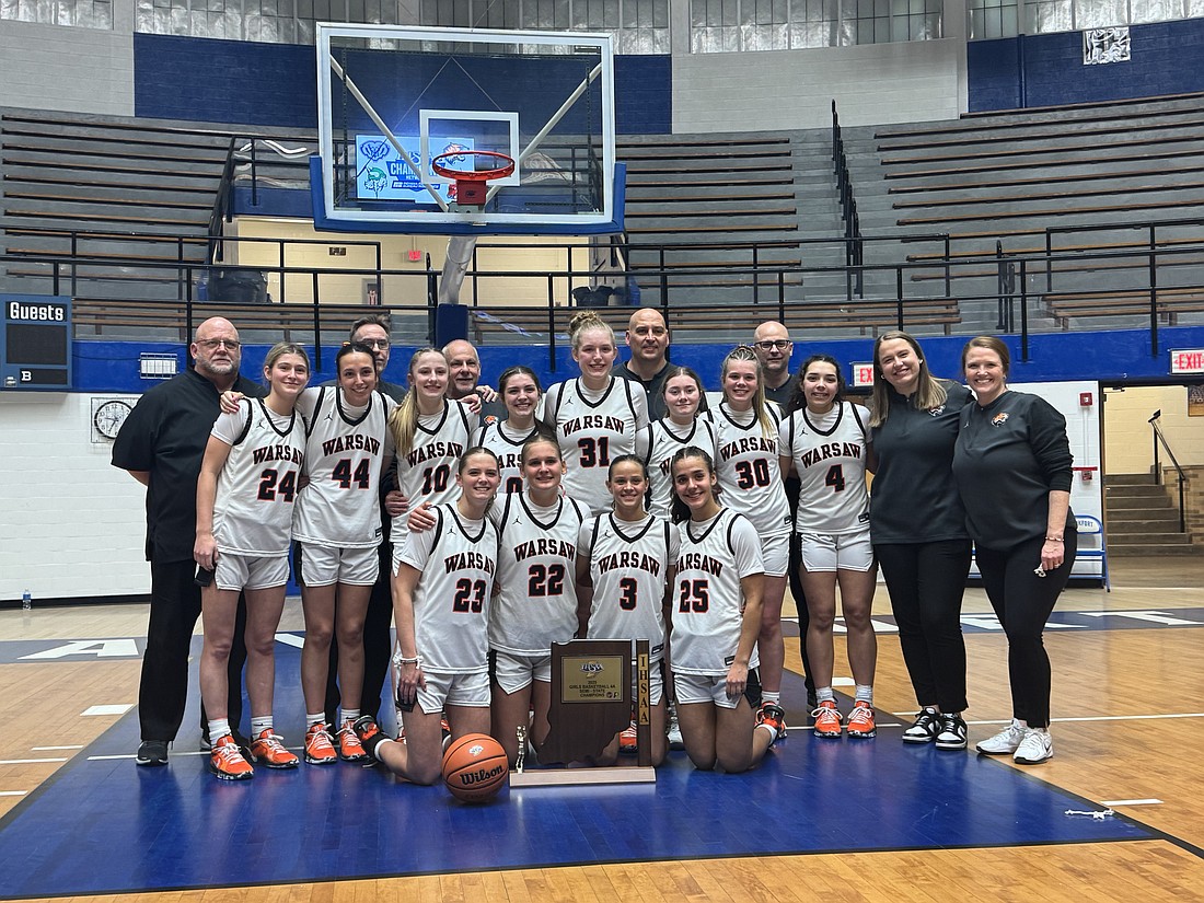 The Warsaw girls basketball team celebrates after knocking off No. 1 Hamilton Southeastern 67-61 to win the Semi-State tournament and clinch a spot in next week's state finals.