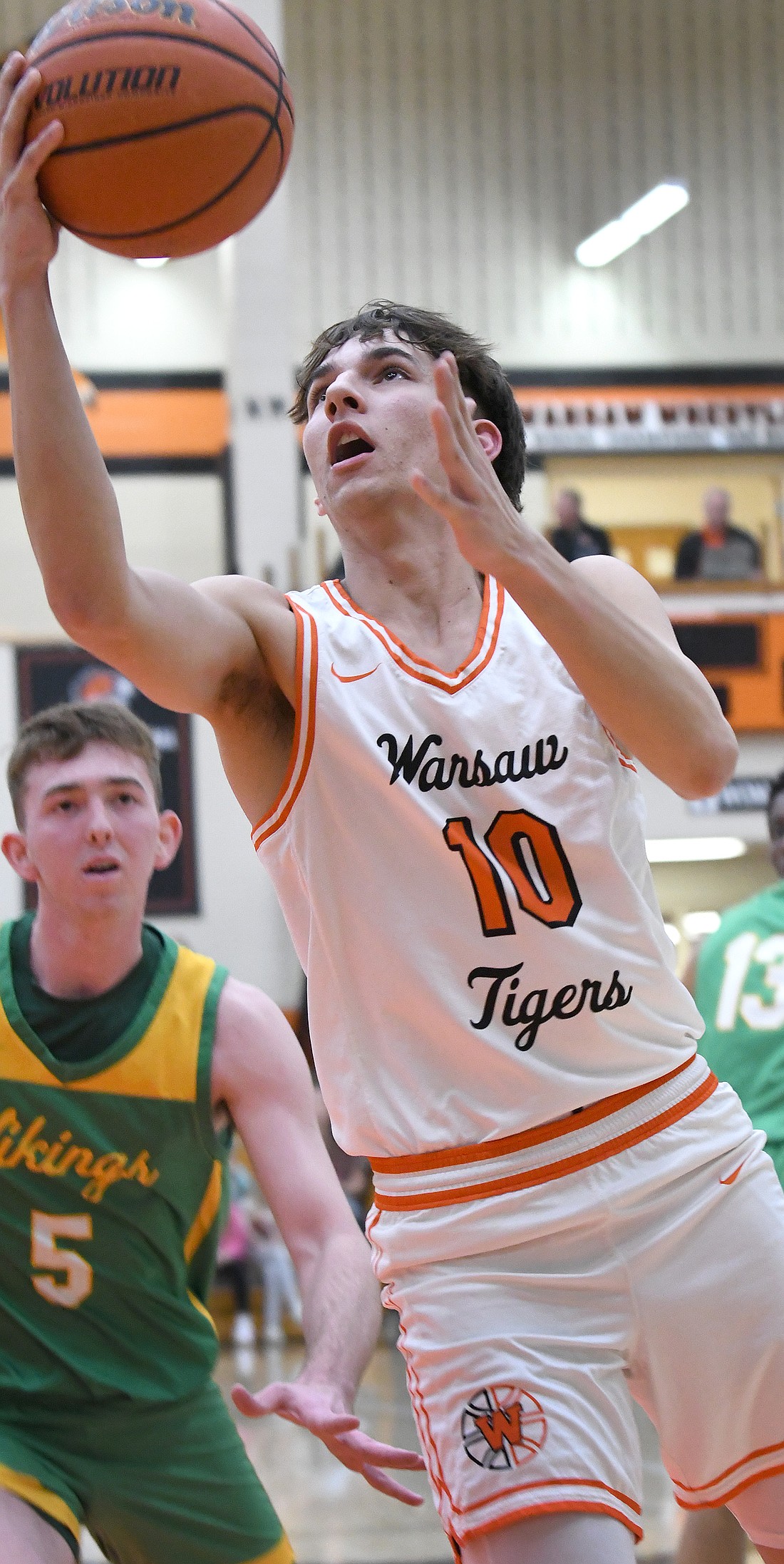 Warsaw senior Robbie Fiinlinson sets his sights on the basket during the first quarter of Tuesday night's home game against Tippecanoe Valley...Niwter