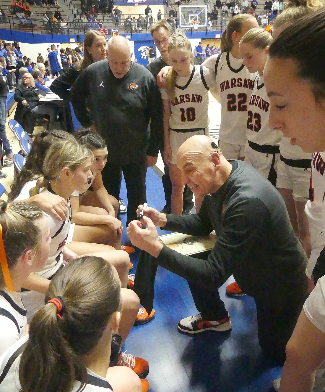 Coach Lenny Krebs emphatically implores the team on to a win during a timeout in the final seconds of the game...Nieter