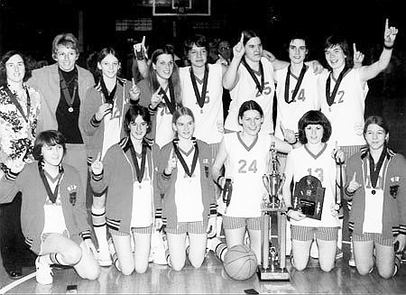 The 1976 Warsaw girls basketball team celebrates after defeating Bloomfield 57-52 to win the first ever girls basketball state championship in Indiana. The Lady Tigers went 22-0. Photo provided by Indiana Basketball Hall of Fame