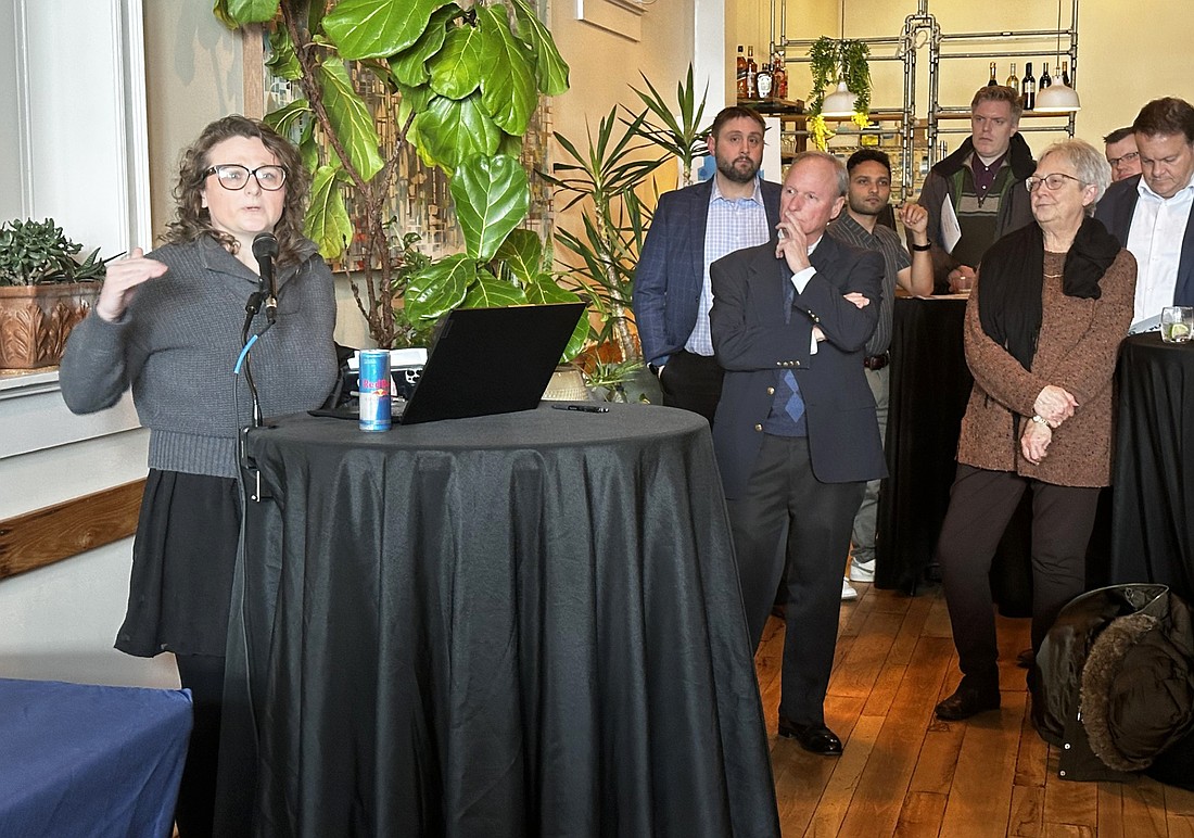 Sarah Froderman, West Central community liaison with the Office of Community and Rural Affairs, speaks to those gathered Thursday at The Vic for the Downtown Warsaw 2030 Strategic Plan launch party. Photo by David Slone, Times-Union