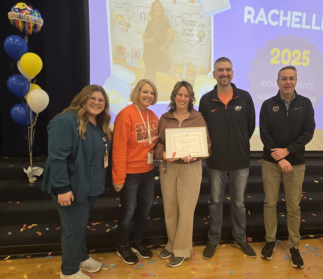 Rachelle Himes was named the Indiana School Nurse of the Year. Pictured (L to R) are Warsaw Community Schools nurse coordinator Kennedy Wagner, district nurse Tracey Akers, Himes, Leesburg Elementary School Principal Nathan Polston and Superintendent Dr. David Hoffert. Photo by Jackie Gorski, Times-Union