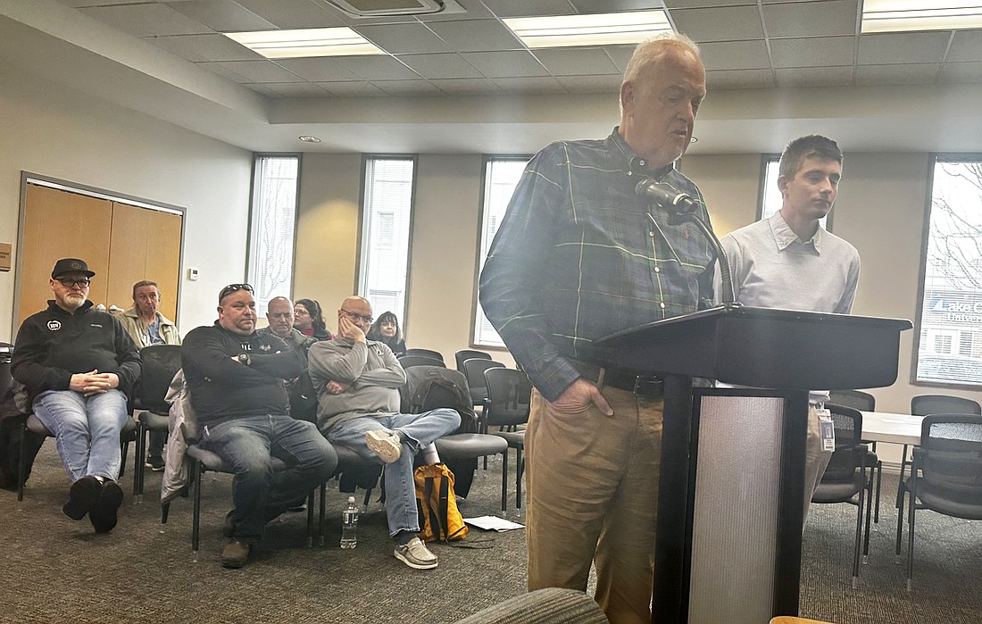 Ride+Walk committee members Fred Helfrich (L) and Nate Callithen (R) speak to the Warsaw Traffic Commission about a grant application Wednesday. Photo by David Slone, Times-Union