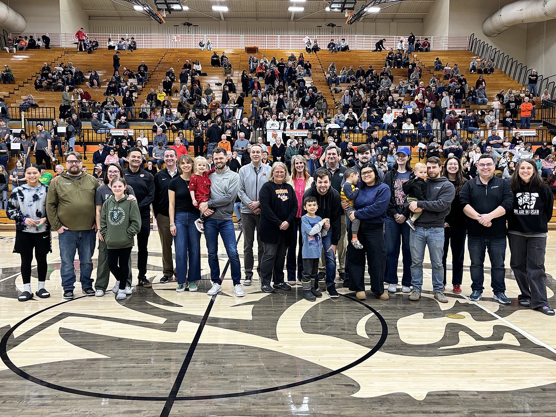 Warsaw Community Schools administrators Dr. David Hoffert, Kyle Carter and Tracy Horrell, along with WCS board members Tom Westerhof and Matt Deuel, recognize the DreamOn Studios team and their families for their dedication to WCS students and strategic initiatives. Photo Provided.