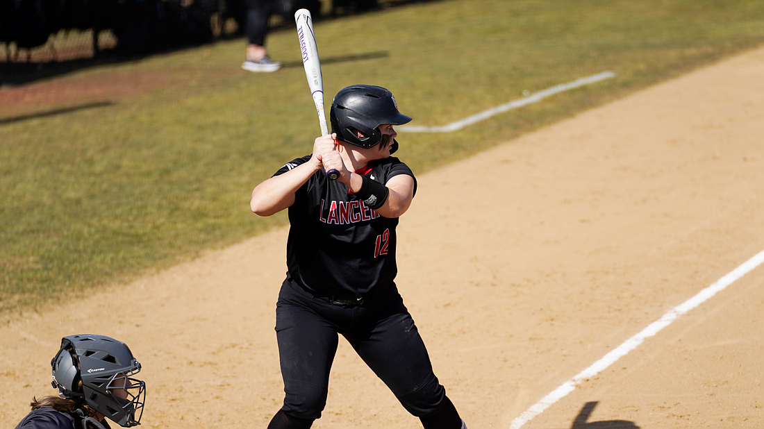 Grace’s Bree Gardinier waits for a pitch while standing in the batter’s box.