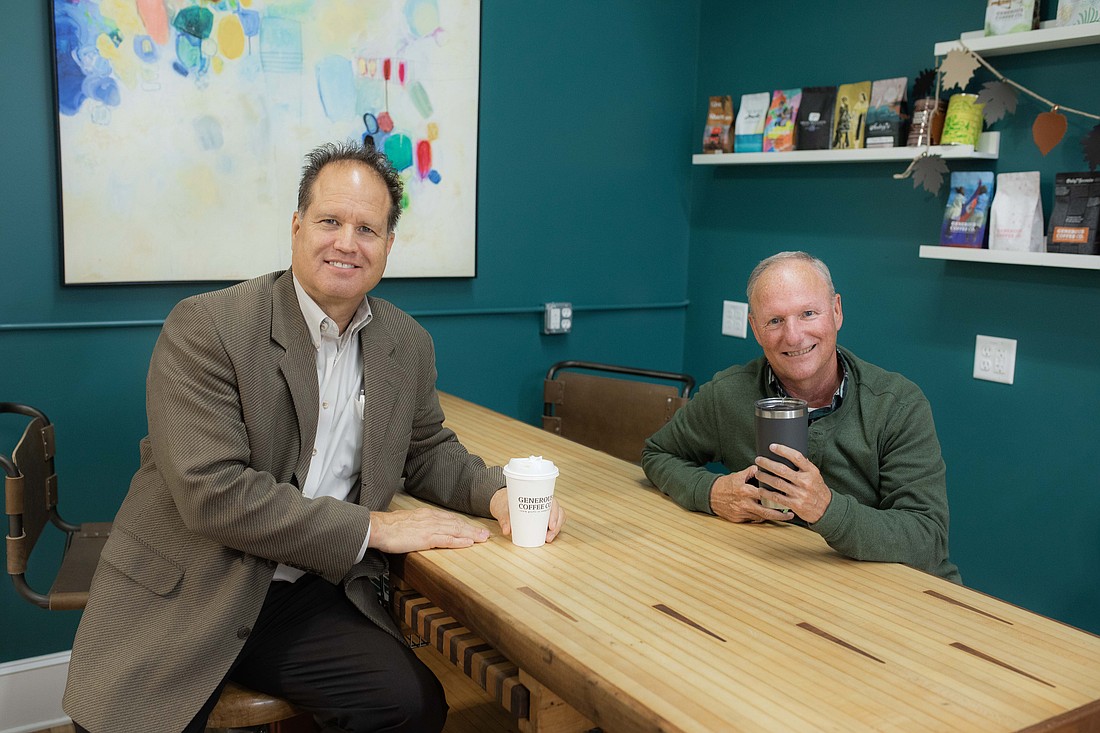 Doug Hanes (L), 1st Source Bank, and Terry Sweeney (R), Main Street Warsaw, enjoy some coffee and conversation during a 2024 Coffee Klatch. Photo by Lauren Klusman Twombly, Kosciusko Chamber of Commerce