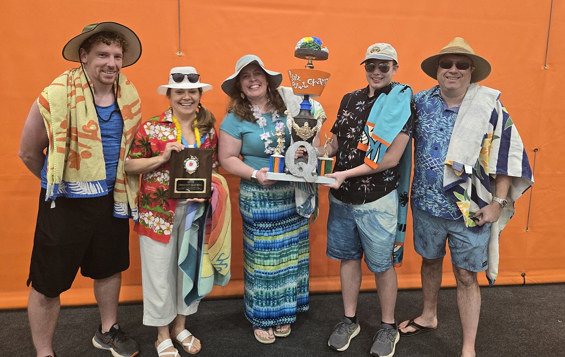 The Warsaw Community High School Science team won the 2025 Warsaw Education Foundation Quiz Bowl Tuesday. Pictured (L to R) are Eric Linn, Melissa Warner, Emily Gough, all science teachers; and Kevin and Michael  Gough. Photo by Jackie Gorski, Times-Union