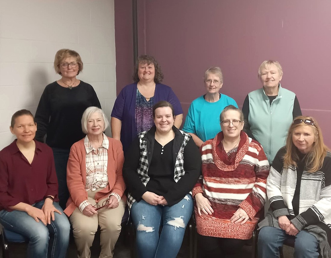 Pictured (L to R) are, front row: Melissa Allwine, RN; Gretchen Baldwin, RN; Andrea Coe, phlebotomist; Deanna Warren, NP; Dreama Lozier, RT; back row; Kathleen Kostro, MPH; Dr. Rebecca Johnson; Sue Bechtold, EMT; and Rose Gesaman, NP. Photo Provided.