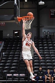 Senior Brett Sickafoose lays the ball in after a breakaway during Friday’s home NAIA game against Carolina.