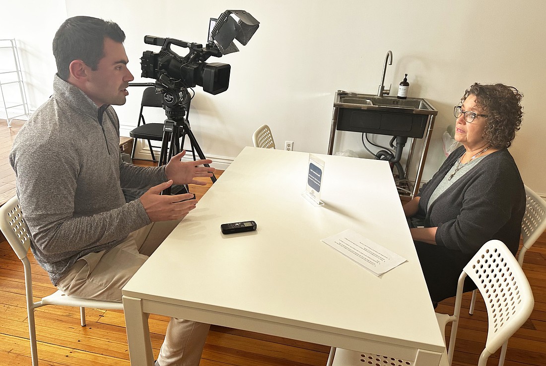 Kosciusko Economic Development Corporation CEO Peggy Friday (R) is interviewed Wednesday by WANE-15 journalist Marcus Truscio (L). Photo by David Slone, Times-Union