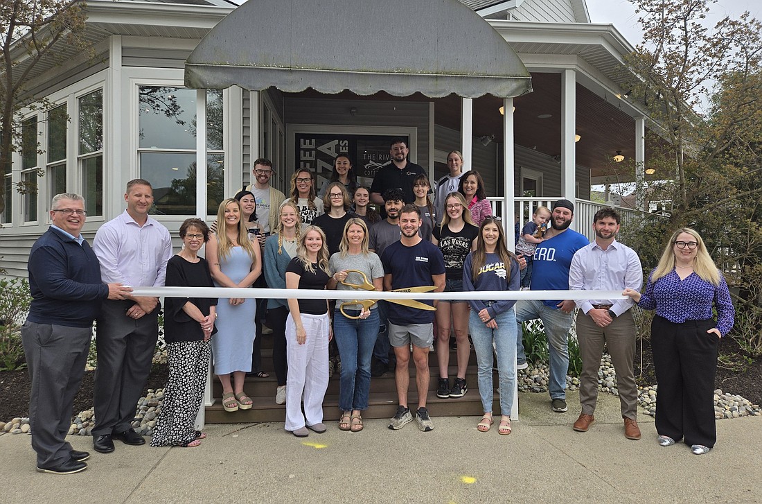 The River Coffeehouse celebrated the opening of its third location Wednesday with a ribbon-cutting ceremony held by the Kosciusko Chamber of Commerce. Pictured are The River Coffeehouse staff and Chamber staff and ambassadors. Photo by Jackie Gorski, Times-Union