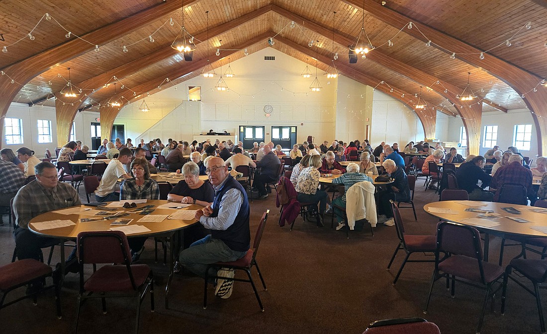 People pray together at the National Day of Prayer at the Rodeheaver Auditorium, Winona Lake, Thursday. Photo by Jackie Gorski, Times-Union