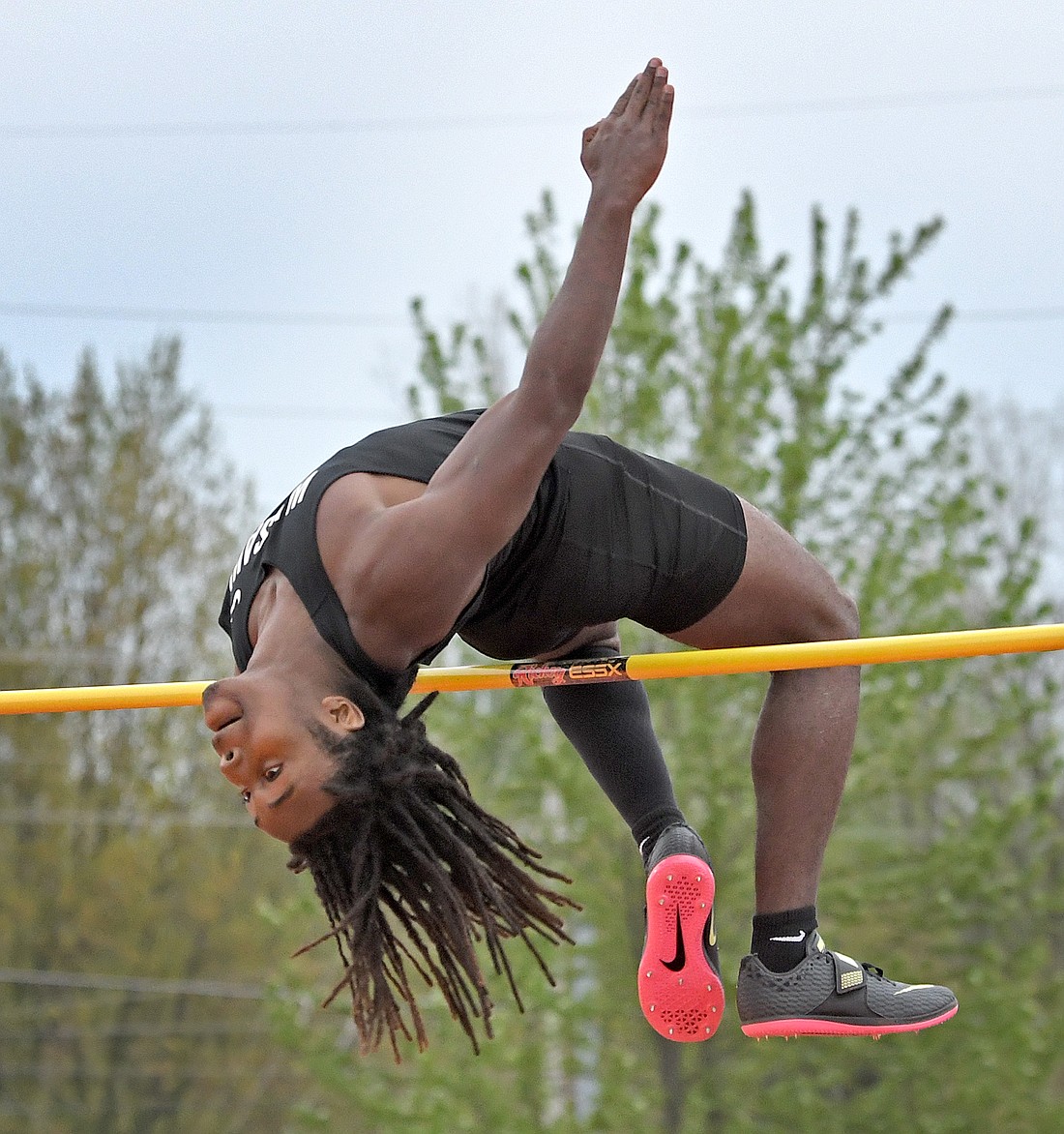 Junior Jordan Randall of Warsaw clears the bar at 7' to set a new Max Truex Meet record...Nieter