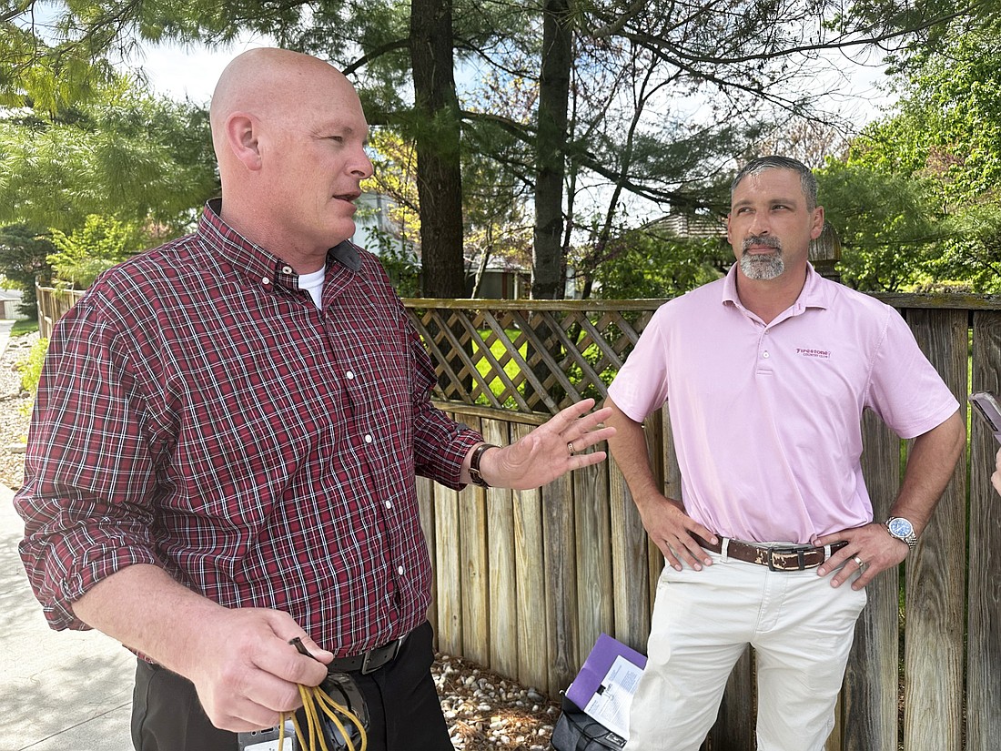 Warsaw Public Works Superintendent Dustin Dillon (R) listens as Mayor Jeff Grose speaks to reporters Wednesday afternoon about the Hodges Addition three-phase infrastructure project. Photo by David Slone, Times-Union