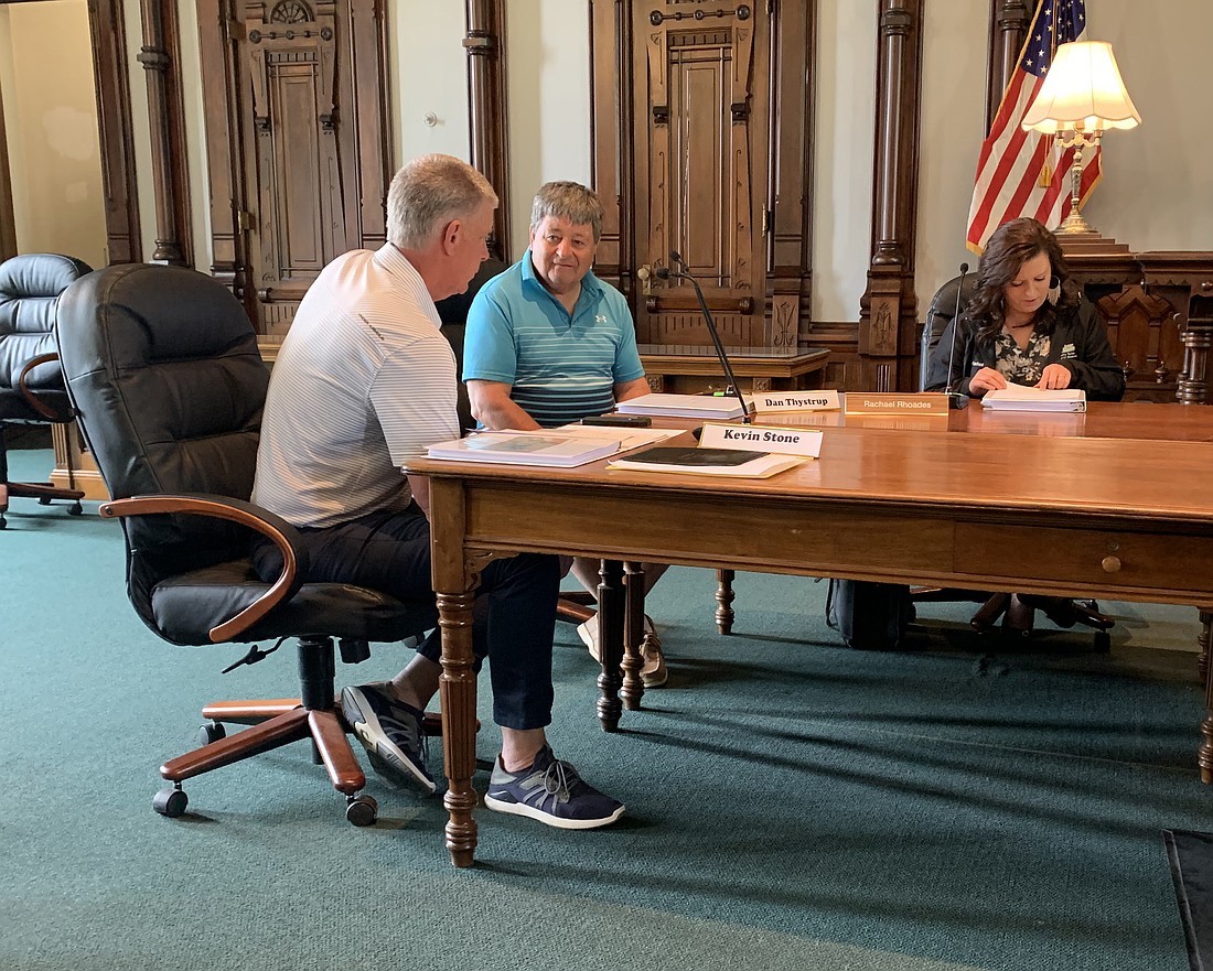 (L to R) Kevin Stone and Dan Thystrup chat while Rachael Rhoades looks over meeting notes. Photo by Elizabeth Hershberger, InkFreeNews
